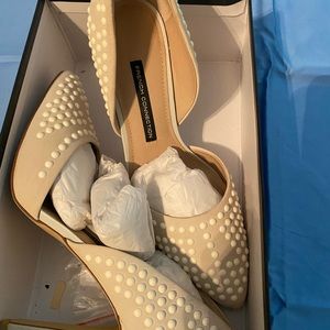 Winter white pumps , US size 9, worn only once for pictures. Great condition.